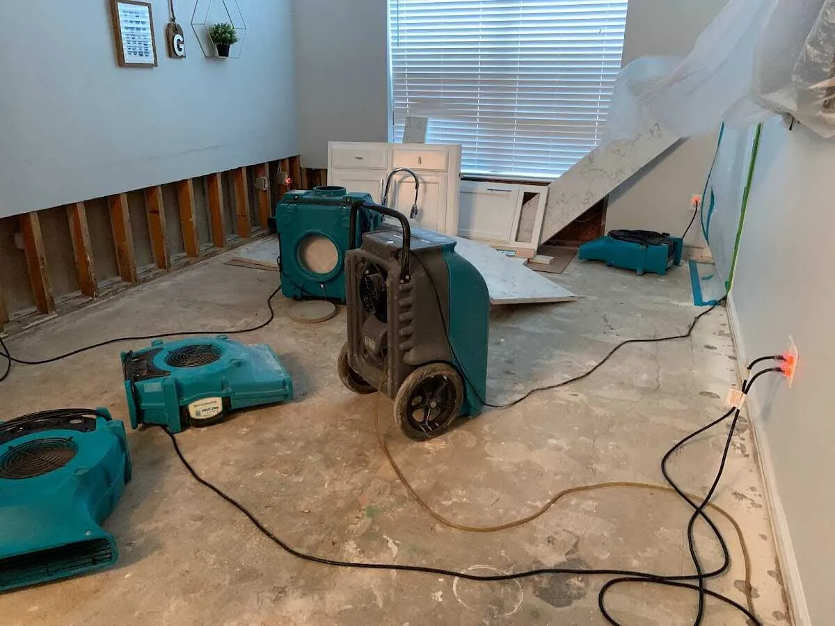 Dehumidifier in flood-cut room for Water Damage Restoration in Bettendorf